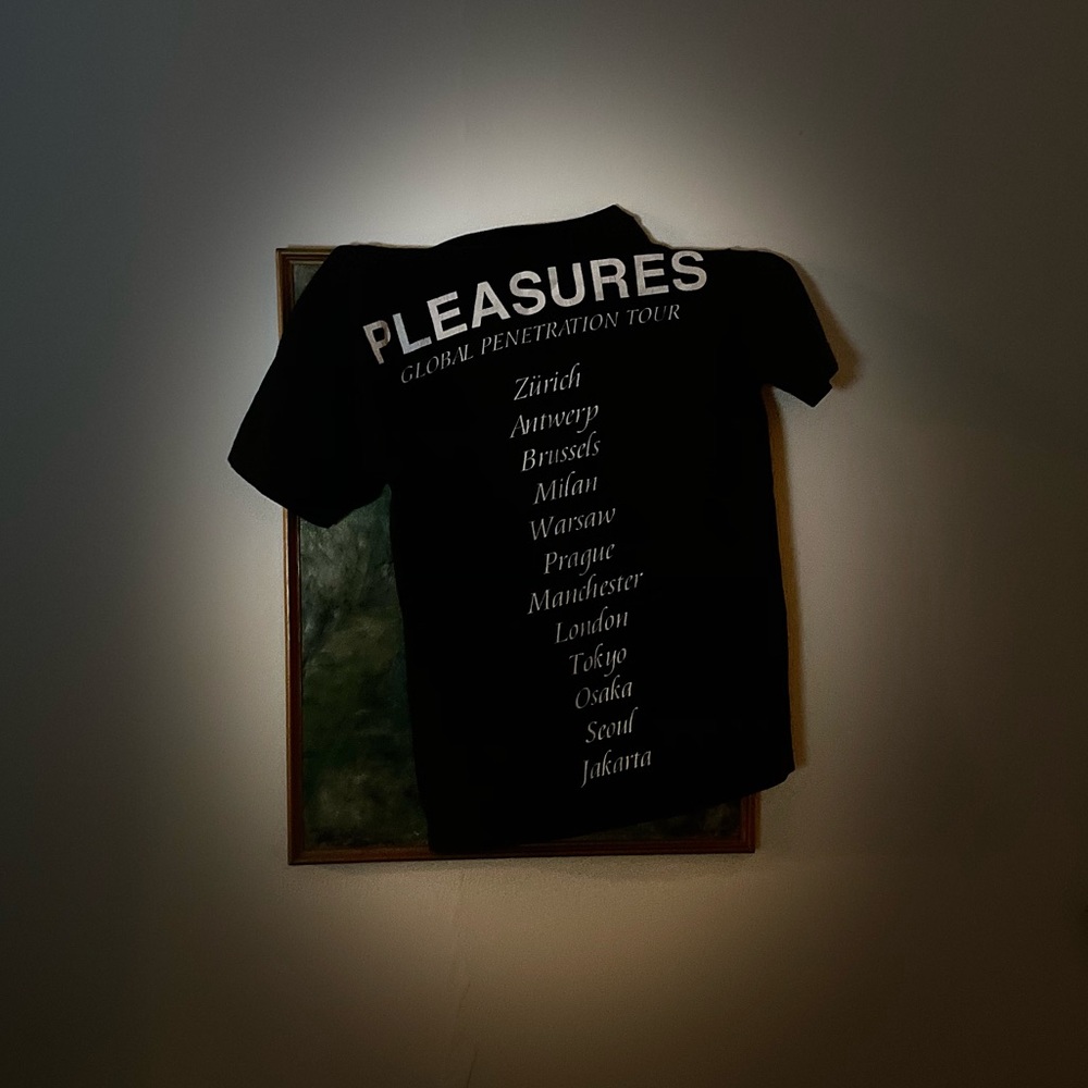 PLEASURES ‘Global Penetration Tour’ T-Shirt
